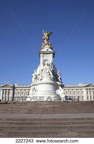 Stock Image - UK, England, Buckingham Palace and Victoria Memorial; London. Fotosearch