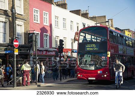 UK, England, Camden; London, Bus going through Camden High Street View Large Photo Image Stock Image - UK, England, Camden; London, Bus going through Camden High Street. Fotosearch