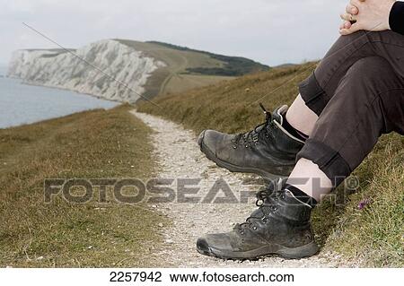 Uk, England, Close-Up Of Boots With Sea In Background; Isle Of Wight View Large Photo Image Stock Image - Uk, England, Close-Up Of Boots With Sea In Background; Isle Of Wight. Fotosearch
