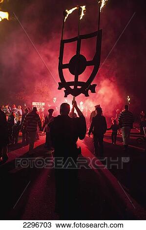 UK, England, East Sussex, Man with banner dressed as monk from Southover Bonfire Society walking in procession of Nevill Junior Bonfire night; Lewes View Large Photo Image Stock Image - UK, England, East Sussex, Man with banner dressed as monk from Southover Bonfire Society walking in procession of Nevill Junior Bonfire night; Lewes. Fotosearch