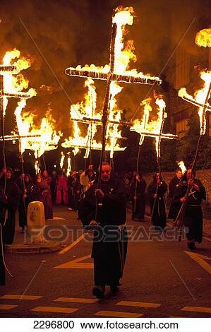 UK, England, East Sussex, People dressed as monks from Southover Bonfire Society walking in procession down street carrying burning crosses to commemorate 17 protestant martyrs burnt at stake; Lewes View Large Photo Image Stock Image - UK, England, East Sussex, People dressed as monks from Southover Bonfire Society walking in procession down street carrying burning crosses to commemorate 17 protestant martyrs burnt at stake; Lewes. Fotosearch