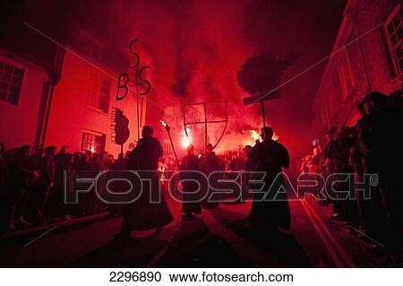 Stock Image - UK, England, East Sussex, People dressed as monks from Southover Bonfire Society lead Grand Procession through streets of Lewes on Bonfire night 2009; Lewes. Fotosearch