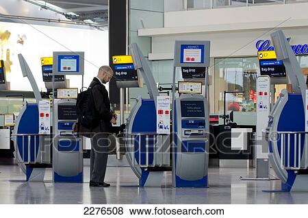 Uk, England, Heathrow Airport Terminal Checkin. View Large Photo Image Stock Photo - Uk, England, Heathrow Airport Terminal Checkin.. Fotosearch