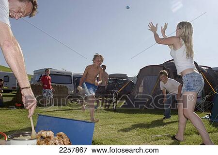 Uk, England, Kids Playing Cricket In Freshwater Beach Holiday Park On Jurassic Coast; Dorset View Large Photo Image Stock Photo - Uk, England, Kids Playing Cricket In Freshwater Beach Holiday Park On Jurassic Coast; Dorset. Fotosearch