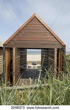 Stock Image - Uk, England, Lincolnshire, View Of Bathing Beauties Beach Hut; Mablethorpe. Fotosearch