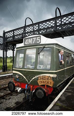 UK, England, Midland Railway; Derbyshire, Indietracks Festival, Train arriving at Swanwick Junction View Large Photo Image Stock Photo - UK, England, Midland Railway; Derbyshire, Indietracks Festival, Train arriving at Swanwick Junction. Fotosearch