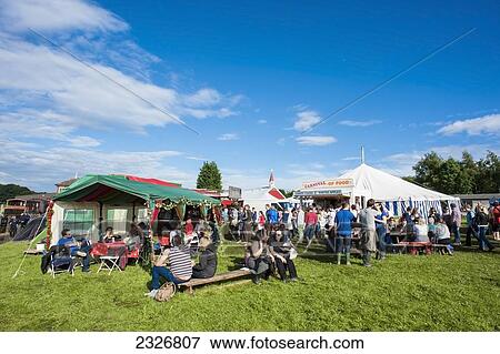 Stock Photo - UK, England, Midland Railway; Derbyshire, Festival goers at Indietracks Festival. Fotosearch