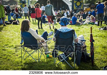 Stock Photograph - UK, England, Midland Railway; Derbyshire, Festival goers at Indietracks Festival. Fotosearch