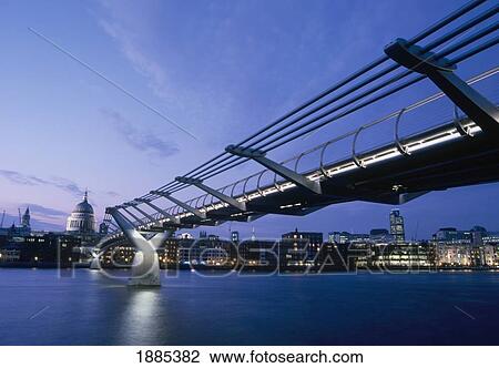 Stock Image - UK, England, Millennium Bridge And St Paul's Cathedral At Dusk; London. Fotosearch