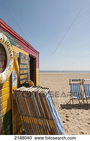 Stock Image - Uk, England, Norfolk, Deckchairs For Hire On Beach; Great Yarmouth. Fotosearch
