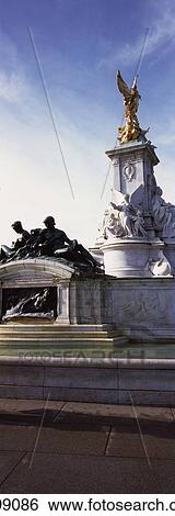 Stock Photograph - Uk, England, Outside Buckingham Palace; London, Completed In 1911, Panoramic Shot Of Victoria Monument Or Memorial. Fotosearch