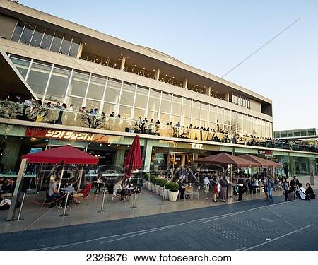 Stock Photograph - UK, England, People having drink at Royal Festival Hall; London. Fotosearch