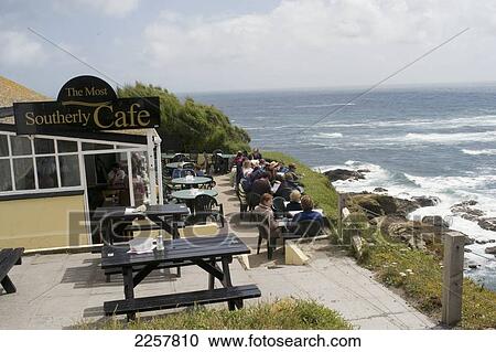 Uk, England, People Relaxing In Cafe At Lizard Point; Cornwall View Large Photo Image Stock Image - Uk, England, People Relaxing In Cafe At Lizard Point; Cornwall. Fotosearch