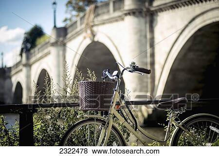 UK, England, Richmond; London, Richmond Park, Bicycle parked near Richmond Bridge View Large Photo Image Stock Photo - UK, England, Richmond; London, Richmond Park, Bicycle parked near Richmond Bridge. Fotosearch