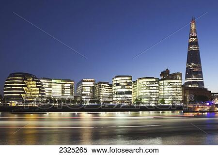 Stock Photography - UK, England, The Shard skyscraper and modern buildings on South Bank of River Thames; London. Fotosearch