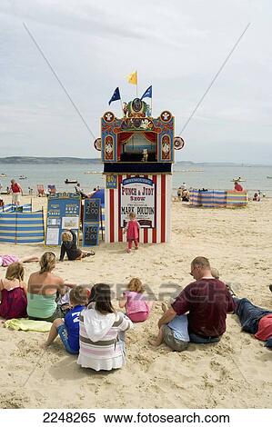 Stock Photography - Uk, England, West Dorset, Punch And Judy On Beach; Weymouth. Fotosearch