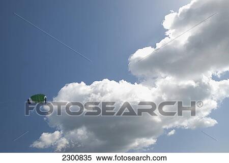 Uk, Flying Kite On Blue Sky With Clouds; Devon View Large Photo Image Stock Photography - Uk, Flying Kite On Blue Sky With Clouds; Devon. Fotosearch