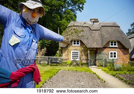 UK, Hampshire, Furzey gardens; New Forest, Scarecrow By Cottage House View Large Photo Image Stock Image - UK, Hampshire, Furzey gardens; New Forest, Scarecrow By Cottage House. Fotosearch