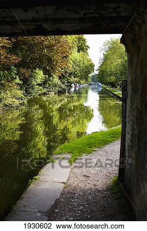 UK, Hertfordshire, and Lush Green Surrounding; Hemel Hempstead, path and barges, Grand Union Canal View Large Photo Image Stock Image - UK, Hertfordshire, and Lush Green Surrounding; Hemel Hempstead, path and barges, Grand Union Canal. Fotosearch