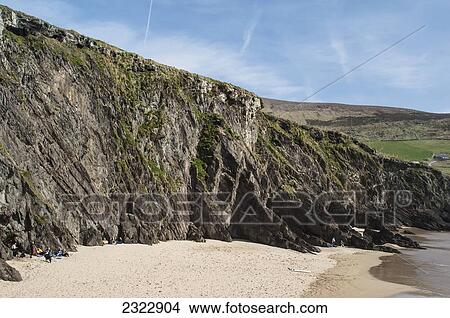 UK, Ireland, County Kerry, Dingle, Slea Head, Coumeenoole, Surfers gathered on beach View Large Photo Image Picture - UK, Ireland, County Kerry, Dingle, Slea Head, Coumeenoole, Surfers gathered on beach. Fotosearch