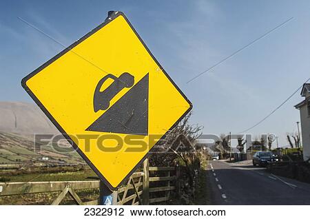 Stock Image - UK, Ireland, County Kerry, Dingle, Steep road warning sign en route to Conor Pass. Fotosearch