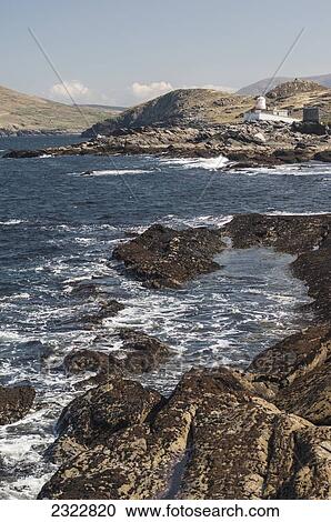 Stock Image - UK, Ireland, County Kerry, Iveragh Peninsula, Valentia Island, Cromwell Point Lighthouse. Fotosearch