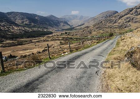 Stock Image - UK, Ireland, County Kerry, Iveragh Peninsula, Road through Gap of Dunloe. Fotosearch