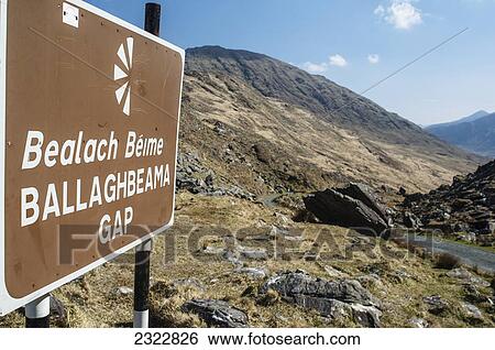 Stock Photograph - UK, Ireland, County Kerry, Iveragh Peninsula, Sign for road to Ballaghbeama Gap. Fotosearch