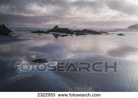 Stock Photography - UK, Ireland, County Kerry, Iveragh Peninsula, Sunset on Saint Finan's Bay. Fotosearch