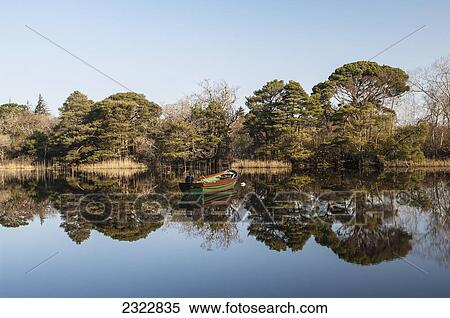 Stock Photography - UK, Ireland, County Kerry, Killarney National Park, Reflections in Lough Leane. Fotosearch