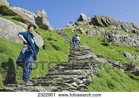 UK, Ireland, County Kerry, Skellig Islands, Tourists on footpath climbing up Skellig Michael View Large Photo Image Stock Image - UK, Ireland, County Kerry, Skellig Islands, Tourists on footpath climbing up Skellig Michael. Fotosearch