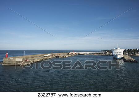 Stock Photo - UK, Ireland, County Wexford, Ferry boat in harbor. Fotosearch
