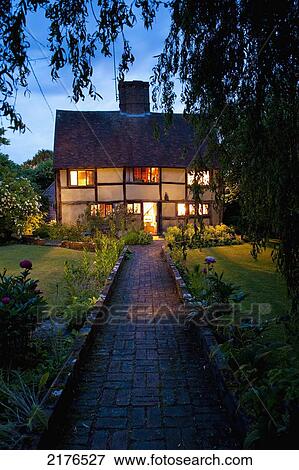 UK, Kent, Old cottage at dusk; Cranbrook View Large Photo Image Stock Photo - UK, Kent, Old cottage at dusk; Cranbrook. Fotosearch