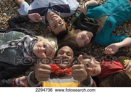 UK, Mixed group of teenagers at seaside; Hastings View Large Photo Image Stock Photograph - UK, Mixed group of teenagers at seaside; Hastings. Fotosearch