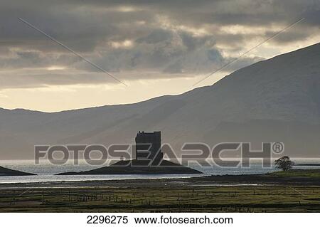 Stock Photography - UK, Scotland, Argyll and Bute, Castle Stalker at dusk; Appin. Fotosearch