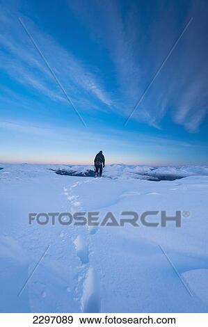 UK, Scotland, Man on summit of Beinn Respiol on Ardnamurchan peninsula; Highlands View Large Photo Image Stock Photo - UK, Scotland, Man on summit of Beinn Respiol on Ardnamurchan peninsula; Highlands. Fotosearch