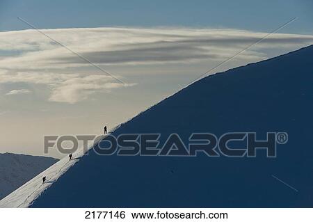 UK, Scotland, Walkers climbing snowy ridge of Sgorr Dhearg in winter near Glen Coe (Glencoe); Highlands View Large Photo Image Stock Photograph - UK, Scotland, Walkers climbing snowy ridge of Sgorr Dhearg in winter near Glen Coe (Glencoe); Highlands. Fotosearch