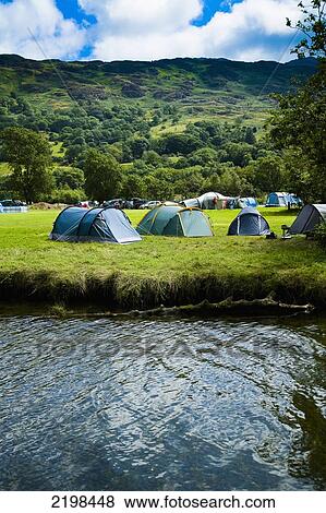 UK, Wales, North Wales, Snowdonia National Park, Tents at Llyn Gwynant Campsite; Nant Ggwynant View Large Photo Image Stock Photo - UK, Wales, North Wales, Snowdonia National Park, Tents at Llyn Gwynant Campsite; Nant Ggwynant. Fotosearch