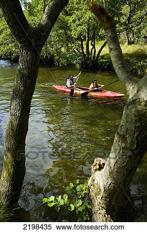 UK, Wales, North Wales, Snowdonia National Park, People kayaking near Llyn Gwynant Campsite; Nant Ggwynant View Large Photo Image Stock Photography - UK, Wales, North Wales, Snowdonia National Park, People kayaking near Llyn Gwynant Campsite; Nant Ggwynant. Fotosearch