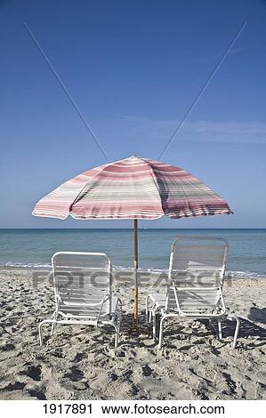 Umbrella And Sunloungers On Lido Beach View Large Photo Image Stock Image - Umbrella And Sunloungers On Lido Beach. Fotosearch