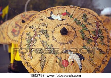 Stock Image - Umbrellas In Flower Festival; Chiang Mai, Thailand. Fotosearch