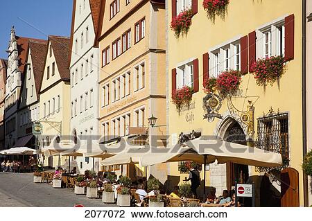 Umbrellas Over Tables Along The Street At The Marketplace; Rothenburg Ob Der Tauber Bavaria Germany View Large Photo Image Stock Image - Umbrellas Over Tables Along The Street At The Marketplace; Rothenburg Ob Der Tauber Bavaria Germany. Fotosearch