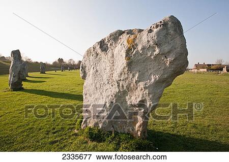 Unesco World Heritage Site Is Neolithic Henge Monument Containing 3 Stone Circles Around Village; Avebury, Wiltshire, England, Uk View Large Photo Image Stock Photo - Unesco World Heritage Site Is Neolithic Henge Monument Containing 3 Stone Circles Around Village; Avebury, Wiltshire, England, Uk. Fotosearch