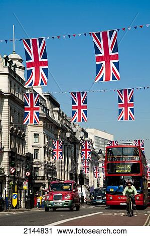 Stock Image - Union Jacks Decorating Regent Street In Central London, London, Uk. Fotosearch