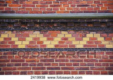 Stock Photo - Unique colourful facade on a brick building; Hamburg, Germany. Fotosearch