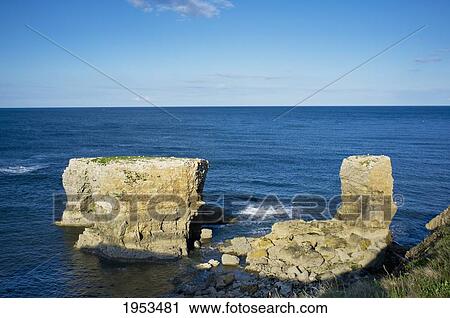 Stock Image - Unique Rock Formations Along The Coast; South Shields Tyne And Wear England. Fotosearch