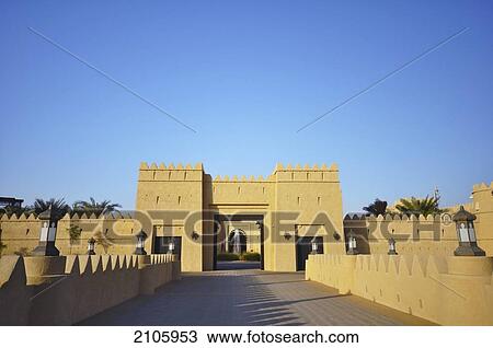 Stock Image - United Arab Emirates, Abu Dahbi, Liwa desert, Qasr al Sarab hotel entrance bridge. Fotosearch