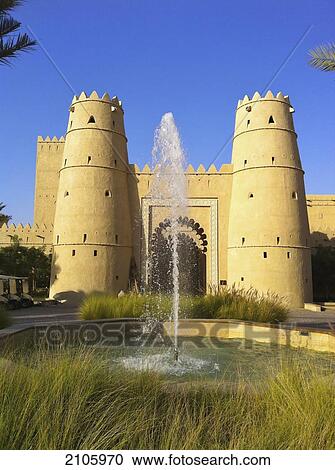 Stock Image - United Arab Emirates, Abu Dahbi, Liwa desert, Qasr al Sarab hotel fountain. Fotosearch