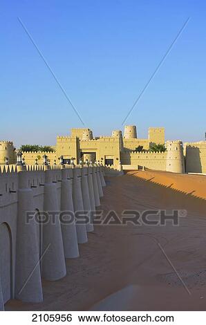 Stock Photograph - United Arab Emirates, Abu Dahbi, Liwa desert, Qasr al Sarab hotel entrance bridge. Fotosearch