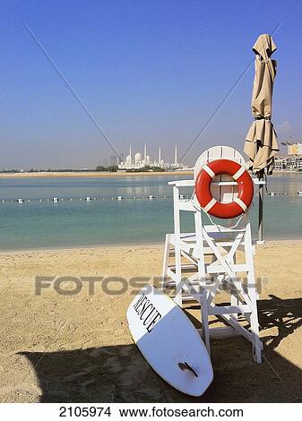 United Arab Emirates, Abu Dahbi, Shangri-la Hotel, Shaikh Zayed Bin Sultan Al Nahyan Mosque in background, Lifeguard chair on beach View Large Photo Image Picture - United Arab Emirates, Abu Dahbi, Shangri-la Hotel, Shaikh Zayed Bin Sultan Al Nahyan Mosque in background, Lifeguard chair on beach. Fotosearch